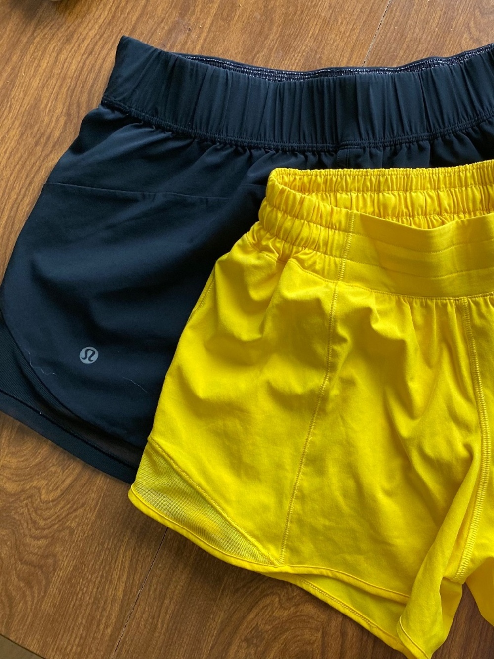 Lululemon Athletica black and bright yellow running shorts Size 6.